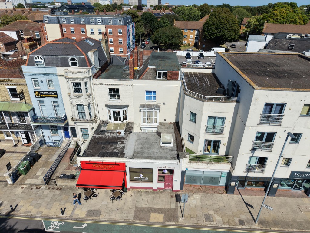 Lot: 56 - SUBSTANTIAL FREEHOLD COMMERCIAL PREMISES FOR OCCUPATION OR REDEVELOPMENT - Aerial view of front elevation